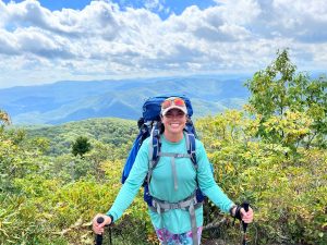 A photograph of Lindsay Gutierrez, a double donor (liver and kidney), on a hike.